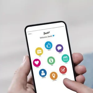 A hand operates a phone running Socrates 360 secure tablets software.